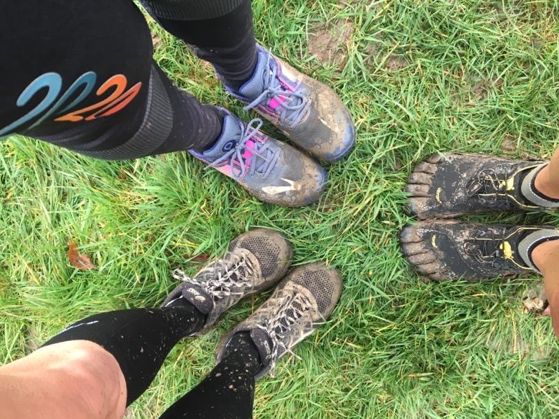 Runners muddy shoes after a race
