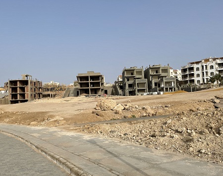 Running in Sharm El-Sheikh outside resort deserted building sandy desert