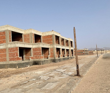 Running in Sharm El-Sheikh outside resort deserted building sandy desert